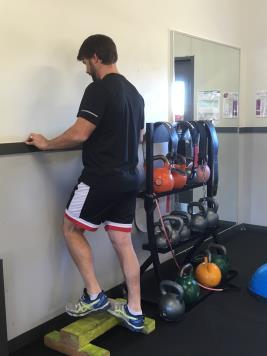 Raise your heels off the ground as high as possible and slowly lower them down. 2 - Eccentric Calf Raise Single Leg Reps Sets Duration Freq.
