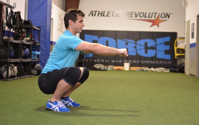 The ground up kettlebell squat is excellent for making the athlete replicate the body positions of both the overhead and front squat positions.
