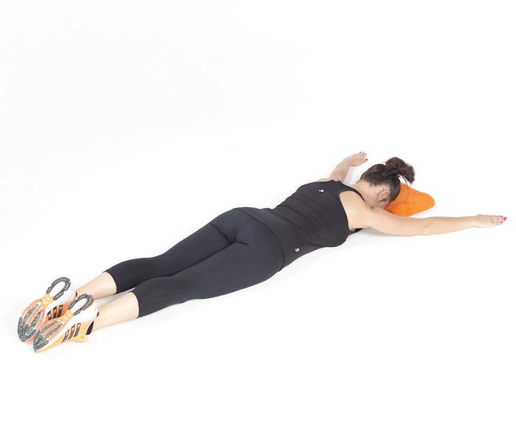 6B Prone Y Lift Lie on your front with arms out to the side Place a towel under your forehead
