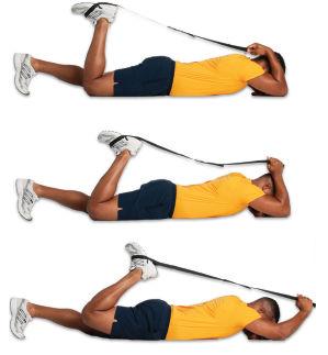 45 Quad Stretch (Strap) Lie on your stomach with the stretch strap wrapped around one foot. The strap should be wrapped around twice.