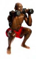 8 TWO HANDED DUMBBELL SQUAT AND PRESS Stand with feet hip-width apart and pointing forward.
