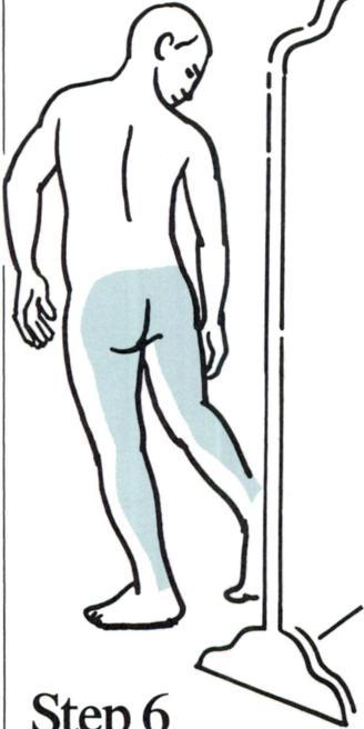 With your back still to the full-length mirror, examine the back of your neck, and your back and buttocks.