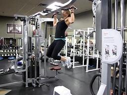 35. Pull up Grasp the bar with an overhand, wide grip. Pull yourself up until your chin is over the bar. Return to full hanging position with control.