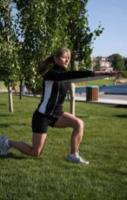 50. Swing Lunge Stand with your feet shoulder width apart, holding a dumbbell or kettlebell at chest height.