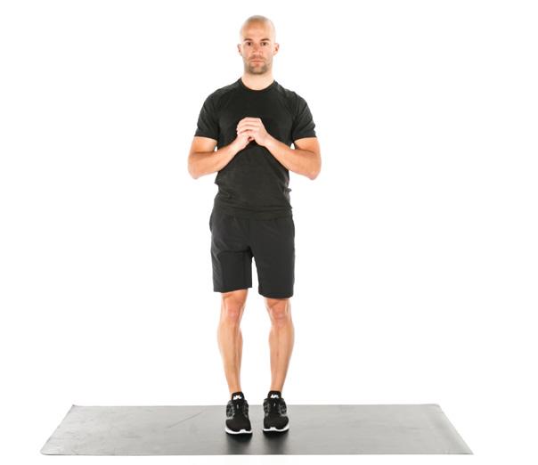 Exertion CURTSY LUNGE 1 MIN Stand tall with your hands at your chest.