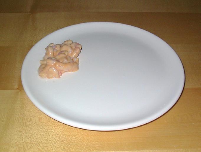 The following pictures show portions of shellfish on a standard side plate.
