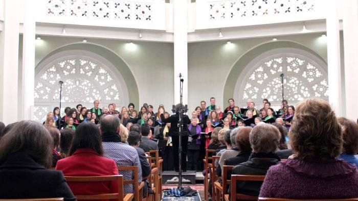 IMAGE: THE 2015 BAHA'I CHORAL FESTIVAL CHOIR, WITH CONDUCTOR LORRAINE MANIFOLD (GEOFF WOOD) The Baha i House of Worship built above Sydney's northern beaches in 1961 is one of on seven in the world.