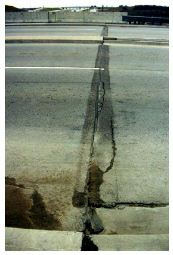 An isolation joint that is carelessly made and where there is insufficient compaction of the subbase, results in the area around the joint being highly prone to early deterioration of the pavement,