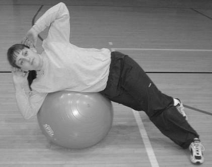 Roll ball forward with arms to tension.