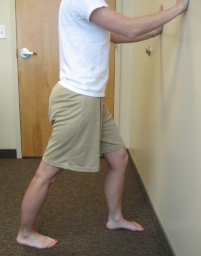 Heel Cord Stretching Standing Stretches 1) Face a wall, standing about two paces away, and place your hands against the wall.