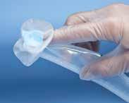 Unfold the length of the catheter to lay flat on the bed, extending the collection bag towards the foot of the bed.