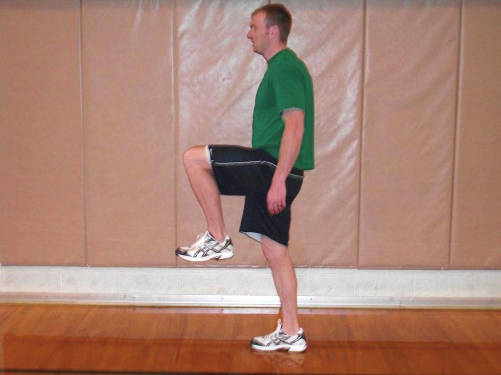 Figure 1. Starting position for dynamic stretch. Figure 3. Starting position for BS and SS (Lunge position, prior to lowering hips). Figure 2. End position for dynamic stretch. Figure 4.