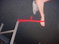 Ankle Inversion: With the theraband still in place, position your body so that your affected leg is