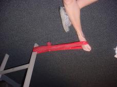 Make sure that the theraband is wrapped around the top of your foot (close to your toes) and pull in