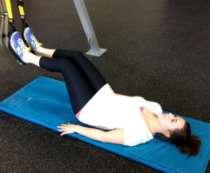 Using the side of the down foot, push bodyweight through heel and lift glutes up as high as possible.