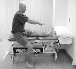 Hip Medial and Lateral Rotation Sitting, towel roll under thigh.