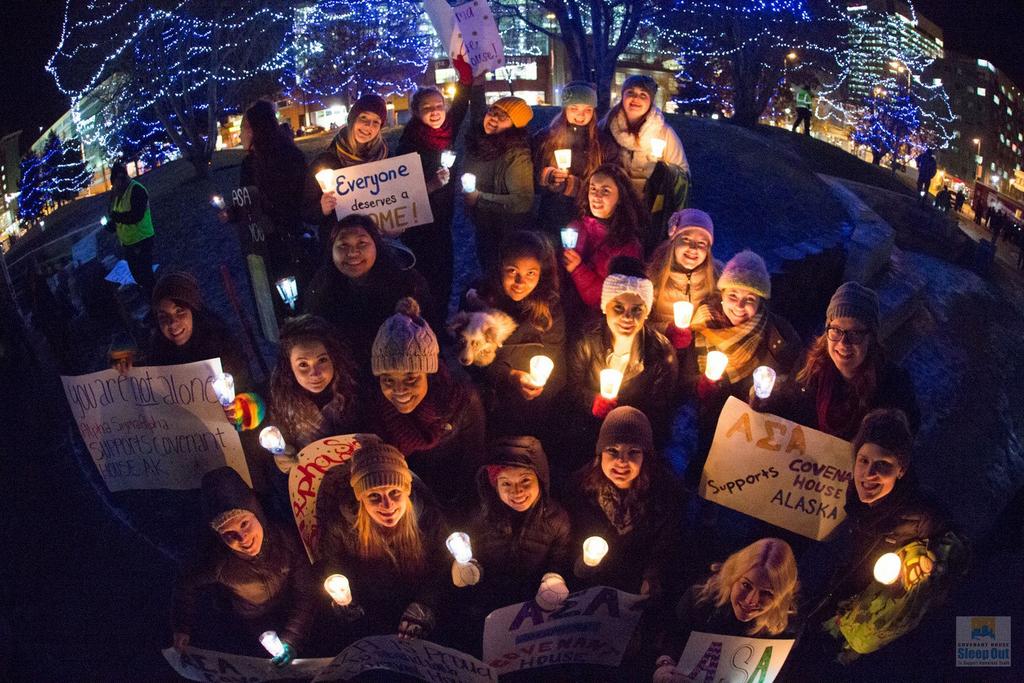 Photo Credit: The community comes together at the 2016 Candlelight Vigil in Anchorage to support and raise awareness of Covenant House Alaska s mission to end youth homelessness and serve suffering