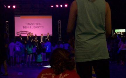 Logo on screen at VictorThon Table in Proud