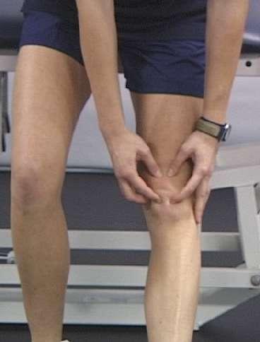 move your kneecap side to side and up