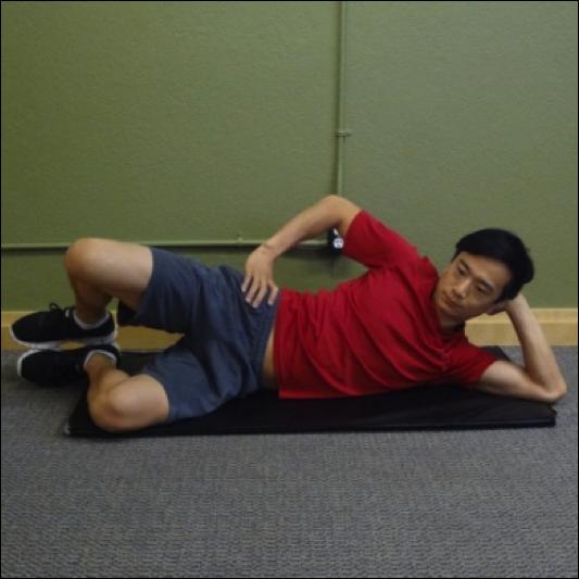 Hip Conditioning Program Clamshells Instructions: Lie on your side with your knees bent and back pelvis and feet aligned.