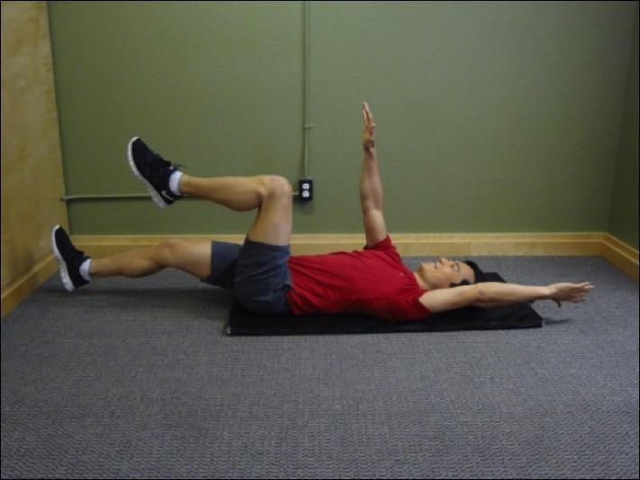 Hip Conditioning Program Single Leg Balance - Around the Worlds Instructions: Stand on one leg and trace an orbit around your body while holding a weight.