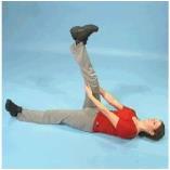 Hamstring Lying on your back. Lift your leg towards your chest. Place your hands behind the knee.