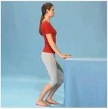 Physiotools Stand with your feet hip width apart and take a step forward.