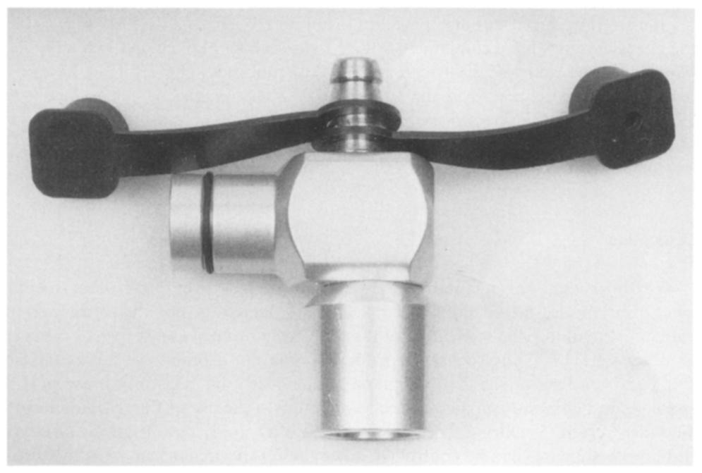 243 Fig. 2. Breathing circuit elbow with a perforated and an unperforated sealing cap. Fig. 3.