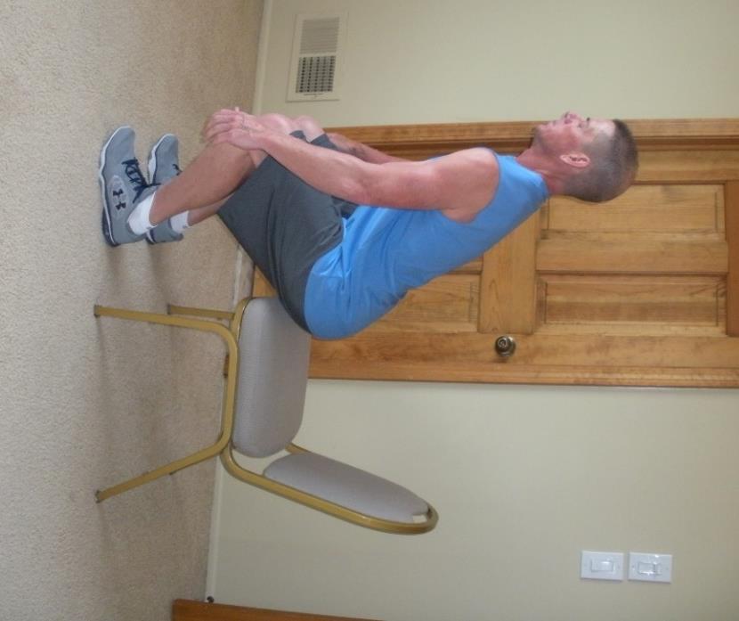 Chair Squat Keep a stable chair handy to prevent falls Sitting on edge of chair with feet and knees lined up with hip joints and