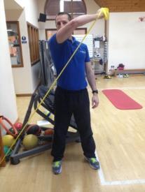 PNF D1 Flexion Stand sideways with your affected shoulder closest to the door and your arm out