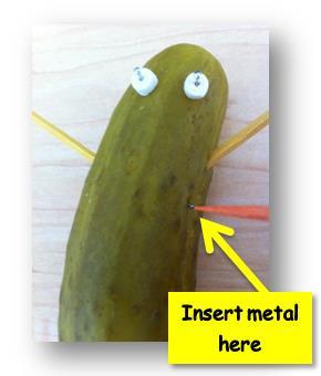 Chapter 1: Page 16 Pickle #1 Insert one of the small pieces of metal within the upper left portion of