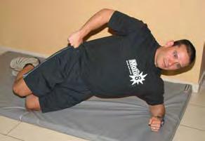 Side Bridge This exercise works your core, hips, and shoulders. Lay on your side with your knees bent to 90 degrees.
