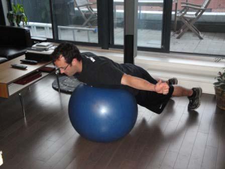 Exercise Descriptions Warm-up T Lie on your chest on a ball and stick your arms out in a T-position