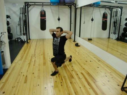 Step backward with one leg, taking a slightly larger than normal step.