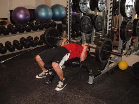 Keep your body tight and lower the bar to your chest.