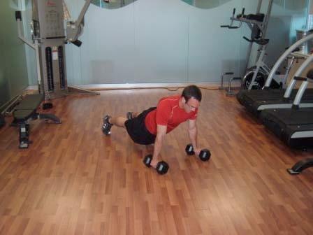 Exercise Descriptions Workout C DB Renegade Row (alternating) Start in the pushup position with your hands