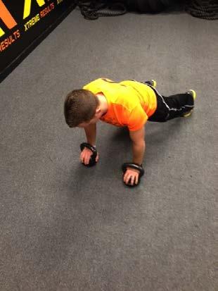 Exercise Descriptions Workout C Kettlebell Close-grip Pushups with Hands on Kettlebells Keep the abs braced and