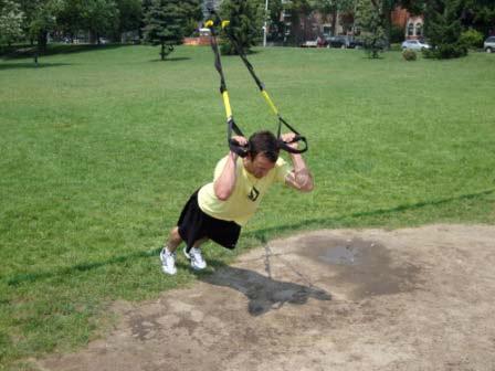Keep your body in a straight line at all times and elbows tucked in. TRX Triceps Extension!