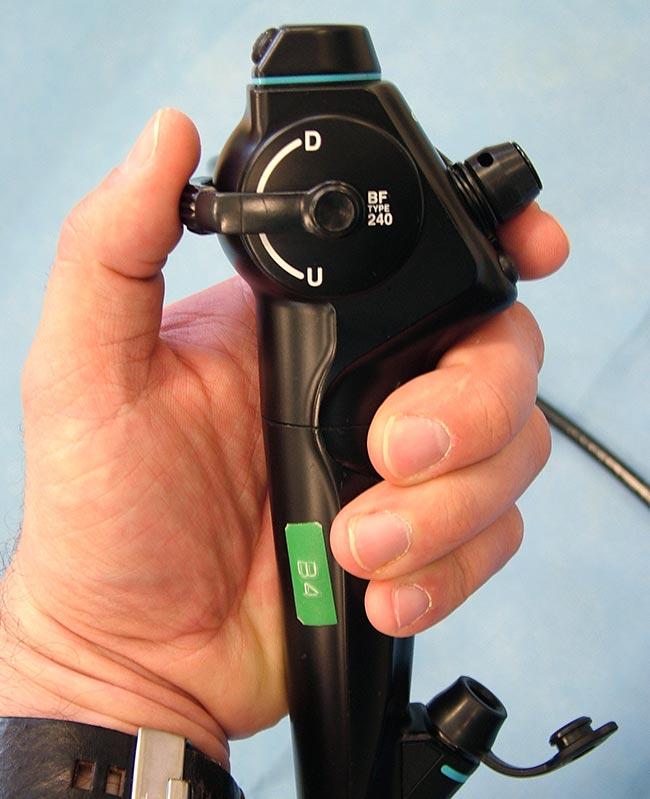 Figure 2. The bronchoscope hand piece, with suction, two-way deflection and open wash channel.