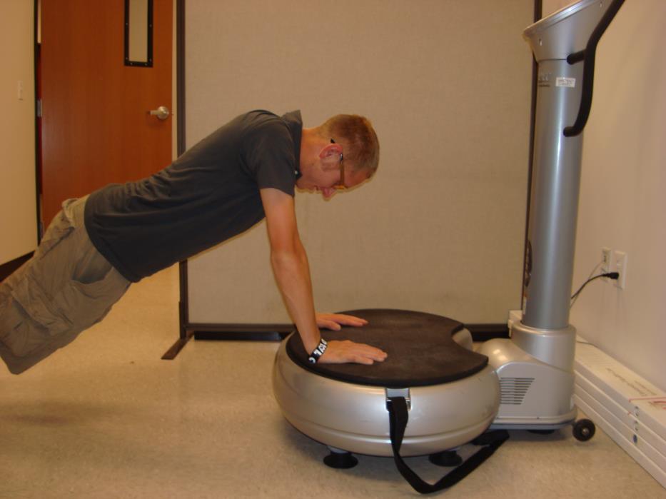 Figure 1b: Plank (CKC) position on Vibration Plate. External rotation measurements were taken in degrees of the dominant shoulder while in a supine position (Awan, Smith, Boon, (2002).
