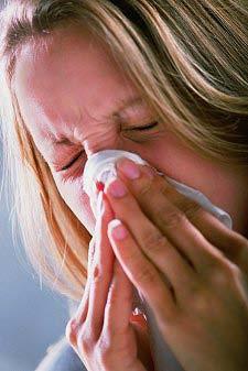 Rhinitis Rhinitis is a term describing the symptoms produced by nasal irritation or inflammation. Symptoms of rhinitis are due to blockage or congestion.