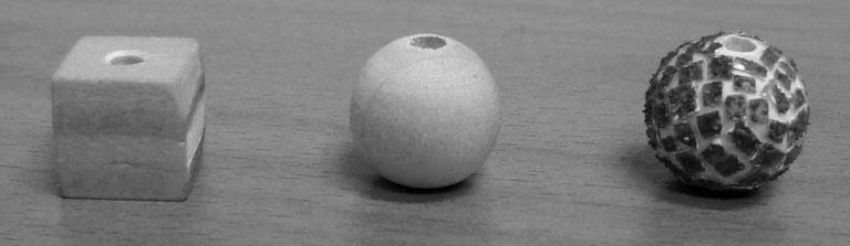 The rough spheres were created by gluing small pieces of sandpaper (Bosch, P60) on the spheres (similar method as Van Polanen et al., 2013). The spheres had a radius of 7.