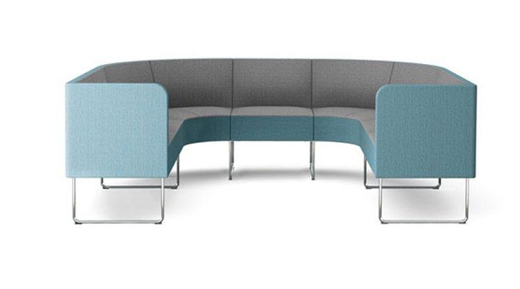 LOUNGE High-backed sofas as well as hanging absorbents are used in this small lounge.