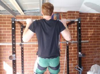 Overhand Pull-ups Perform a pull-up with an overhand grip (palms facing away from you).
