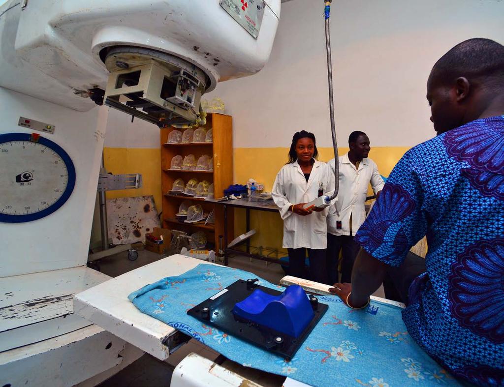 A patient prepares for radiotherapy treatment at Korle Bu Teaching Hospital, Ghana.