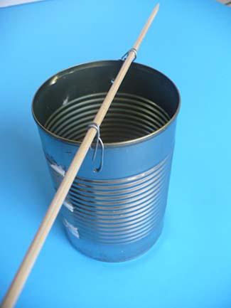 2 of 10 9/12/2018, 1:26 PM 1. Use the can opener to remove the bottom from the larger can, so that you have a cylinder that is open on both ends. Be careful after opening as the edges might be sharp.