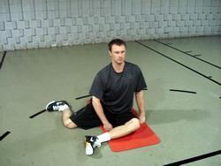 Warm-up / Stretch Descriptions (Ordered Alphabetically) 90 / 90 Hip Stretch Sit on the floor with your front and back legs each making a 90 degree angle.