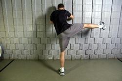 Horizontal Leg Swings Stand 2 feet off of a sturdy wall (arms extended, palms on the wall).