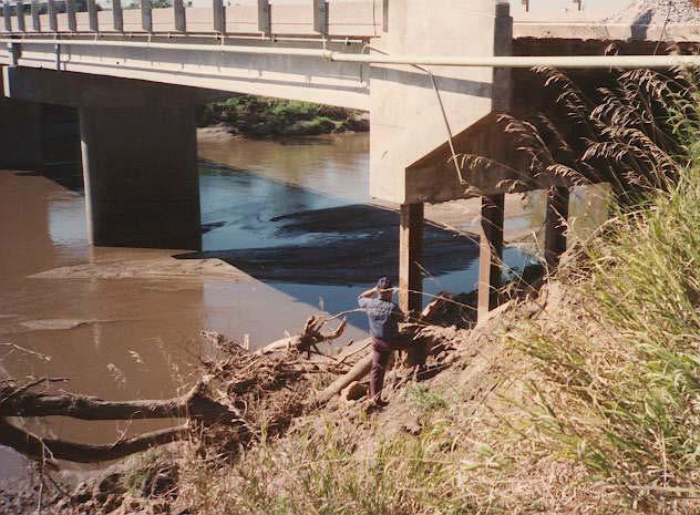 geotechnical strength of the spillslope limits the extent of scour. The actual depth of flow-induced scour leading to embankment failure can be unremarkable.