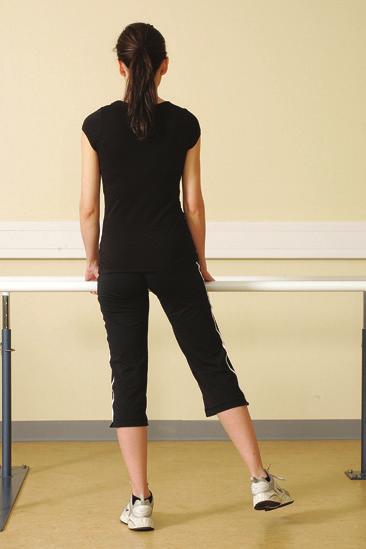 Straighten the leg, keeping the thigh in contact with the chair, hold for a few seconds and slowly lower. 9 2.
